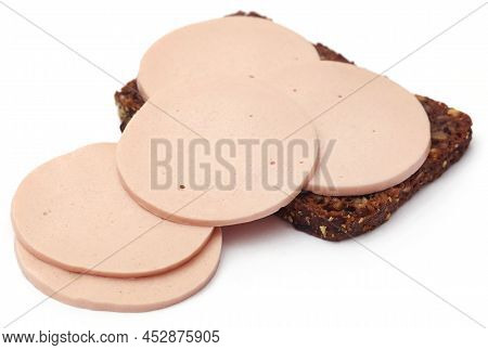 Salami On Rye Bread Over White Background