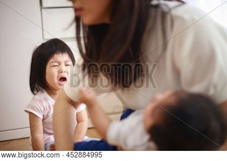 Image Of A Girl Crying At Home
