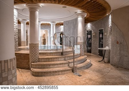 Elegant Round Jacuzzi In Modern Bathroom In Luxurious Ski Resort