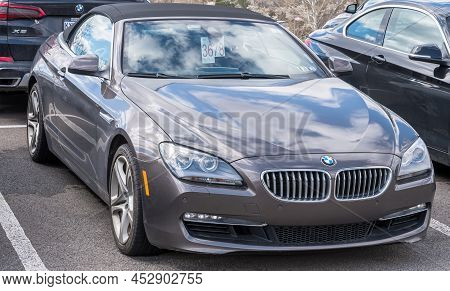 Monroeville, Pennsylvania, Usa April 10, 2022 Bmw Coupe Convertible For Sale At A Dealership With Th