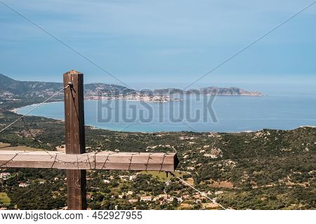 View Of The Bay Of Calvi And Revellata From A Wooden Cross High Above The Town Of Lumio In The Balag