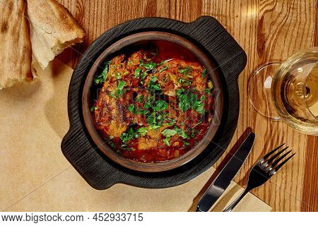 Traditional Georgian Chashushuli Of Stewed Veal With Onion, Herbs And Tomato Gravy