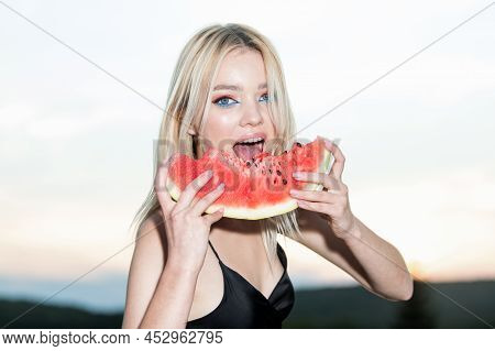 Sexy Girl Eating A Watermelon. Fashion Glamor Portrait Of Beautiful Sexy Stylish Blonde Young Woman 