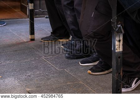 Badajoz, Spain, 04, 15, 2022. Detail Of The Feet Of Costaleros During A Holy Week Procession