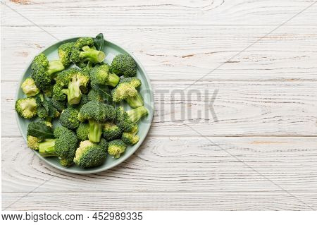 Broccoli Of Fresh Green Broccoli In Bowl Over Coloredbackground. , Close Up. Fresh Vegetable.