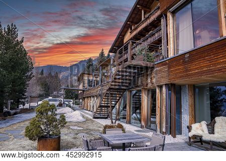 Beautiful Wooden Chalet Hotel On Slope Of Mountain During Winter Season