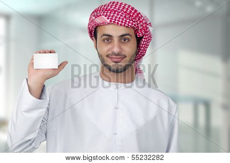 Portrait of a business man holding an empty business card