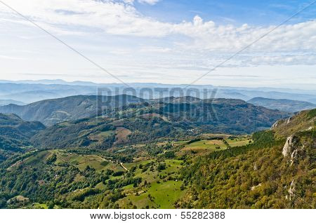 Viewpoint on a landscape of mount Bobija, peaks, hills, meadows and green forests