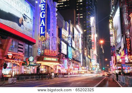 NEW YORK CITY, NY - DEC 12: 42nd Street with traffic and commercials on December  12, 2011 in New York City. 42nd Street is a major crosstown street known for its theaters and landmark architectures.