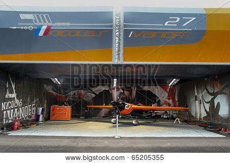 PUTRAJAYA, MALAYSIA - MAY 17, 2014: The Edge 540 V2 plane of Nicolas Ivanoff of France parks at the hangar before the race during the Red Bull Air Race World Championship 2014 in Putrajaya, Malaysia.