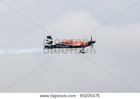 PUTRAJAYA, MALAYSIA - MAY 17, 2014: Nicolas Ivanoff from France in an Edge 540 V2 plane takes to the skies of Putrajaya during the qualifying session of the Red Bull Air Race World Championship 2014.