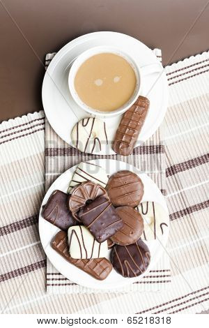 cup of coffee with chocolete biscuits