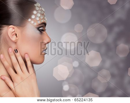 Woman Professional Make Up On Blurry Background