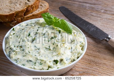 Herb Butter In A Bowl On Wood