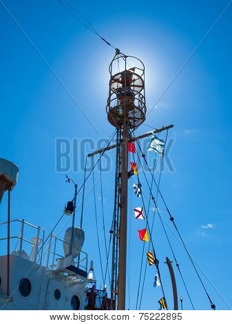 Columbia Lightship Main Light With Nautical And American Flags Hanging