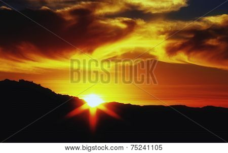 Sunset with the cloudy sky