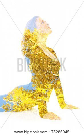 Double exposure portrait of young woman performing yoga asana
