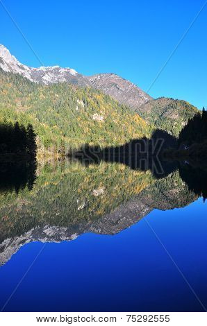 Mountain with its reflection on a lake