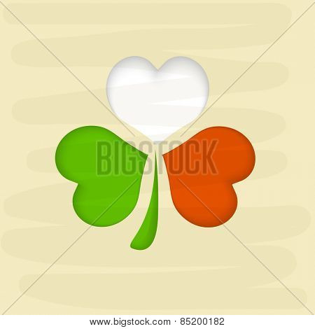 Happy St. Patrick's Day celebration with shamrock leaf in Irish Flag colors.