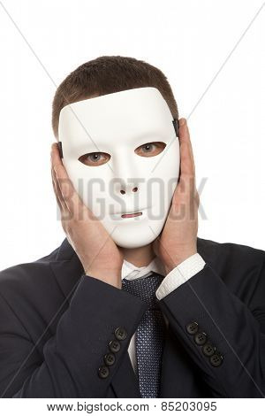 Businessman covering his face with white mask