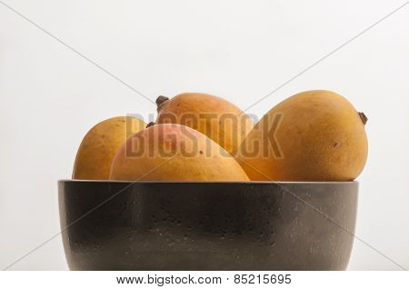 Popular Indian Alfonso mangoes. Whole mangoes placed in a bowl.