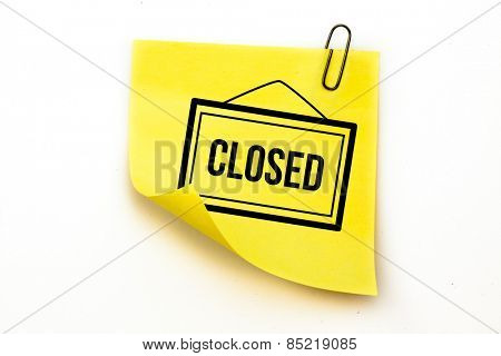 Closed sign against sticky note with grey paperclip