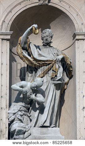 VIENNA, AUSTRIA - OCTOBER 10: Statue of Saint on baroque Jesuits church. The church was built between 1623 and 1627. in Vienna, Austria on October 10, 2014.