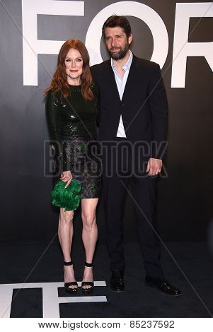 LOS ANGELES - FEB 20:  Julianne Moore & Bart Freundlich arrives to the Tom Ford Autumn/Winter 2015 Womenswear Collection Presentation  on February 20, 2015 in Hollywood, CA                