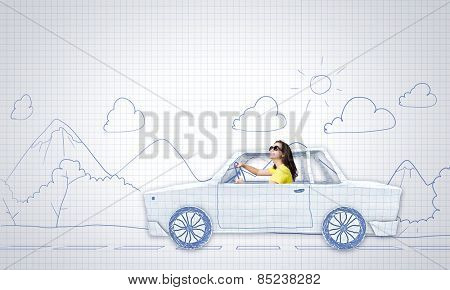 Young woman riding car made of list of paper