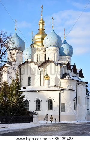 KAZAN, RUSSIA - JANUARY 4, 2015: People under the Annunciation Cathedral of the Kazan Kremlin. Built in 1555-1562, it is federal listed cultural heritage venue