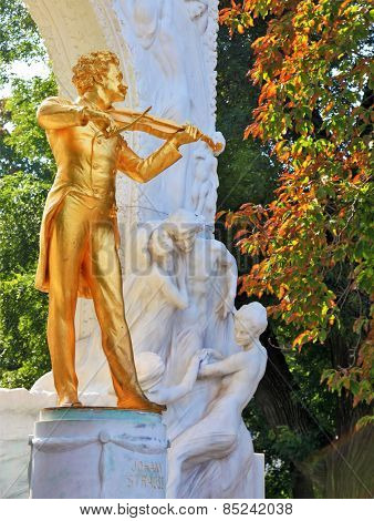 Waltz King. Gorgeous gilded statue of Johann Strauss with violin