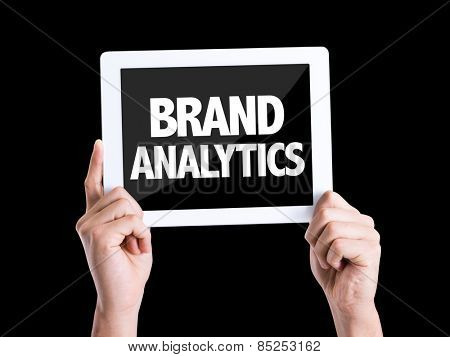 Tablet pc with text Brand Analytics isolated on black background