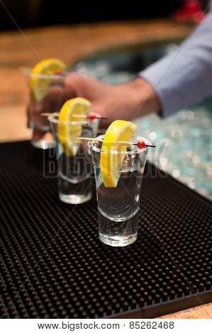 Three Tequila Shots With Lemon