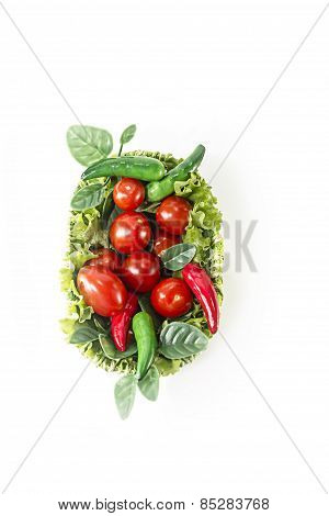 red and green vegetables in green basket