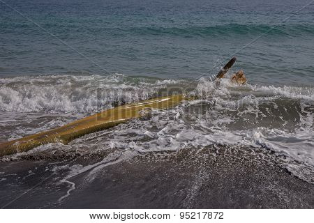 Wooden flotsam on caribbean beach