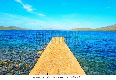 Rocky Pier In Porto Conte