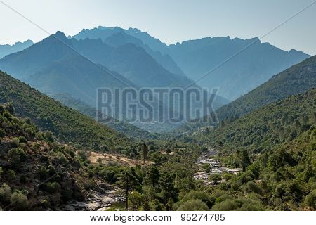 Fango Valley In Corsica With Mountains In Background