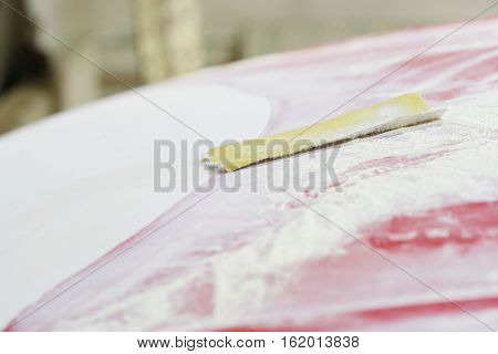 flint-paper on a glazed car hood