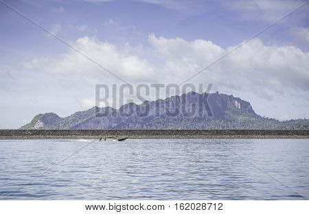 Beautiful mountain with blue sky at chiewlarn dam or ratchaprapa dam Suratthani Thailand.