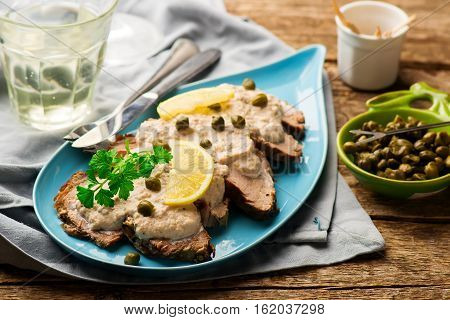 Vitello tonnato . selective focus. style rustic