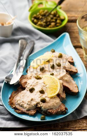 Vitello tonnato . selective focus. style rustic