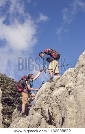 Help support and help in a dangerous situation to hike in the mountains.