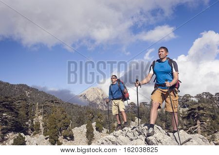 Hiking in the mountains in the summer on a sunny day.
