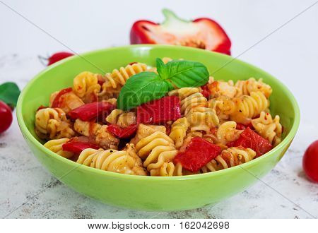 Fresh Radiatori pasta with chicken and peppers
