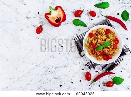 Radiatori Pasta With Chicken And Peppers On White Background. Top View
