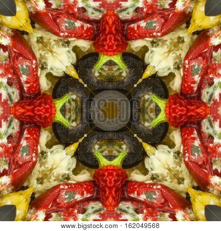 Decorative printing olives and peppers. Wrapping paper for food. Kaleidoscope of olives and stuffed peppers. Tablecloth from raw foods. Vegetarian diet. Spicy peppers.