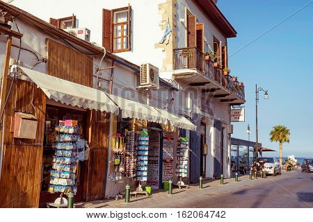 LARNACA CYPRUS - AUGUST 27 2016: Larnaca old town pedestrian area and souvenir shops.