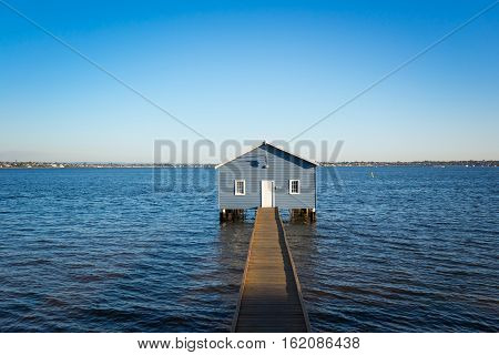 Sunset over the Matilda Bay boathouse in the Swan River in Perth Western Australia.