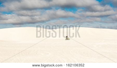 Dune bike rider at the Lancelin sand dunes near Perth in Western Australia