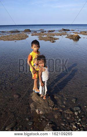 BALIINDONESIA - JUNE 16,2012: Children on the beach